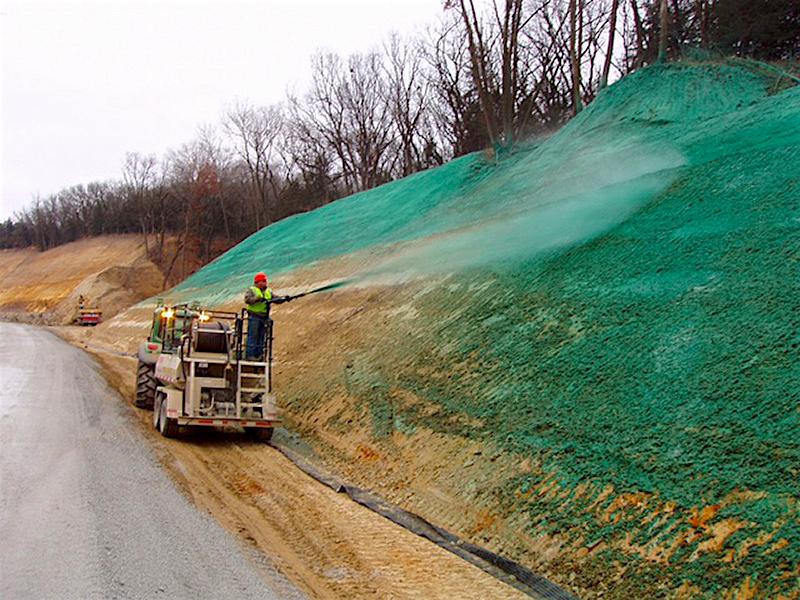 Hydroseeding a roadside slope for erosion control